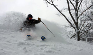 photo of backcountry skier at caberfae peaks