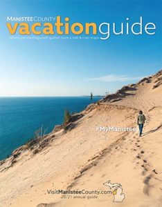 2020 Annual Guide Cover of dunes along arcadia lakeshore
