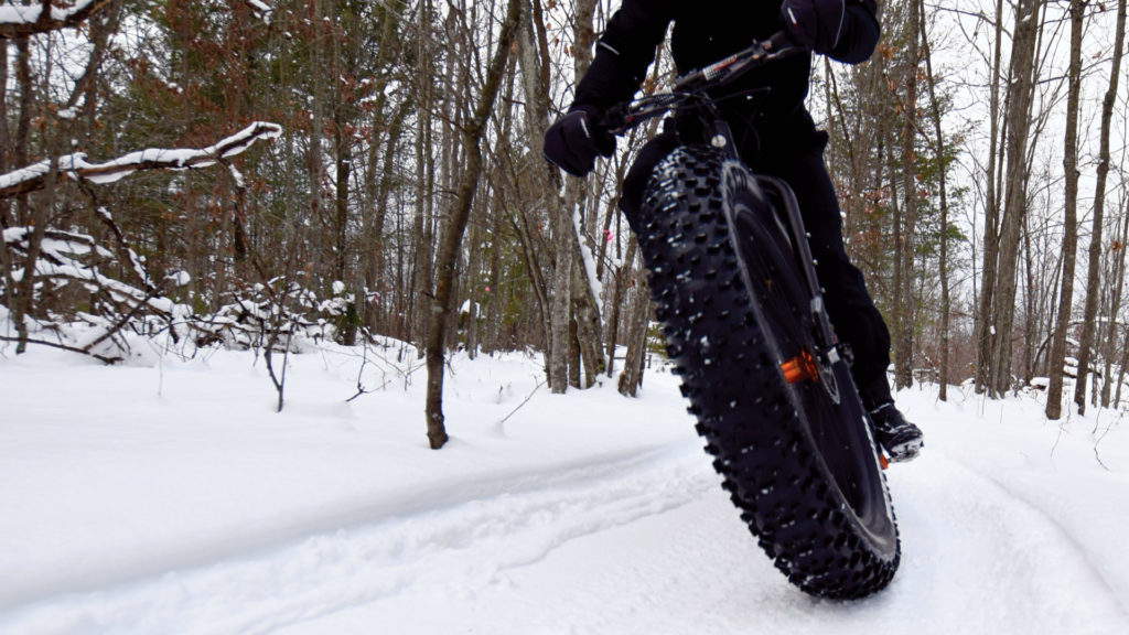 Close up of fat bike on winter trail