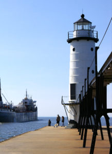 North pier lighthouse and freighter