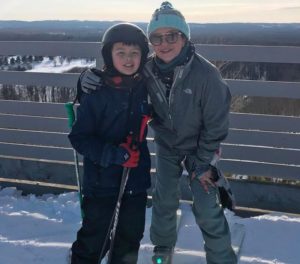 mom and son skiing at crystal mountain