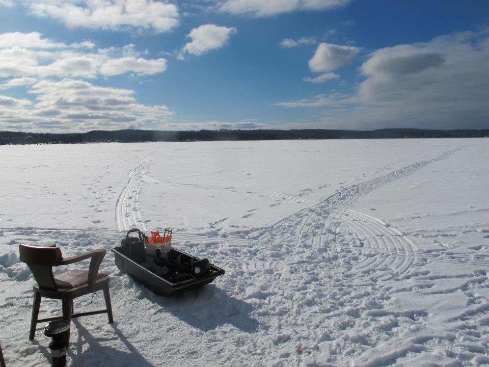 Frozen lake ice fishing