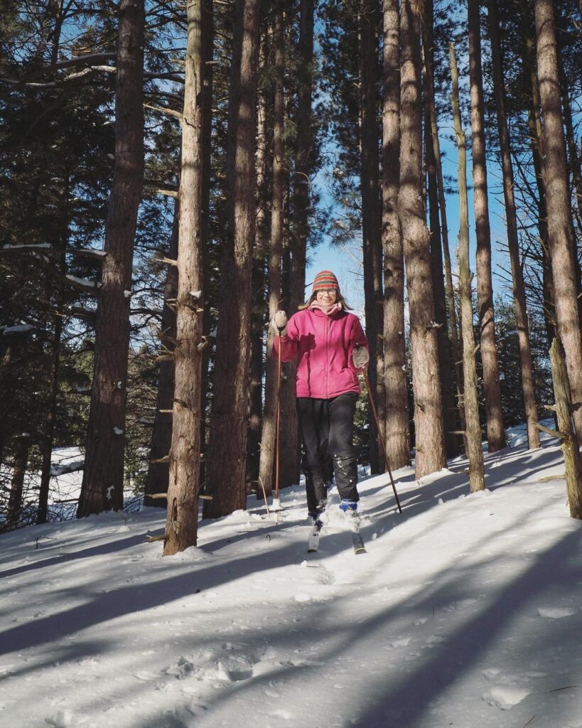 Woman xc skiing